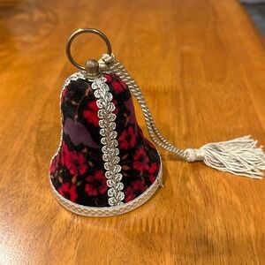 Velvet covered musical bell made in West Germany. Made for the Broadway